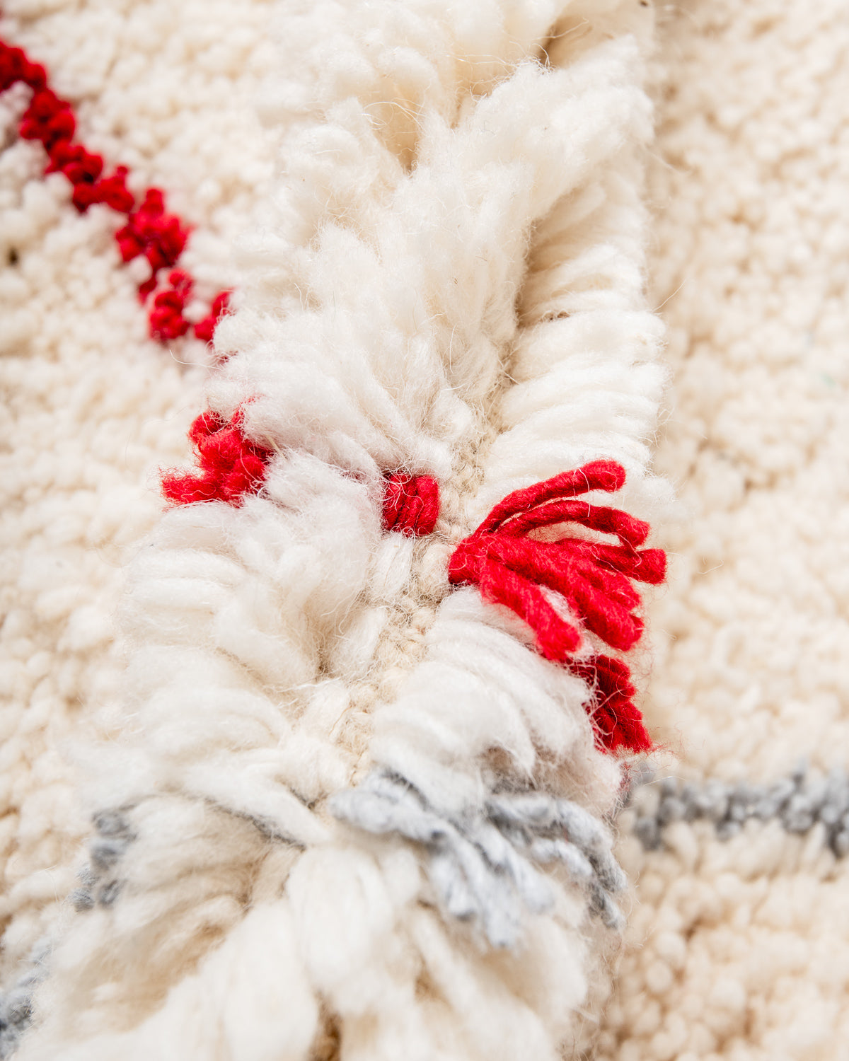 Modern, designer, handcrafted Berber rug from Morocco. Beniourain carpet with beautiful colours and patterns and fluffy wool texture.